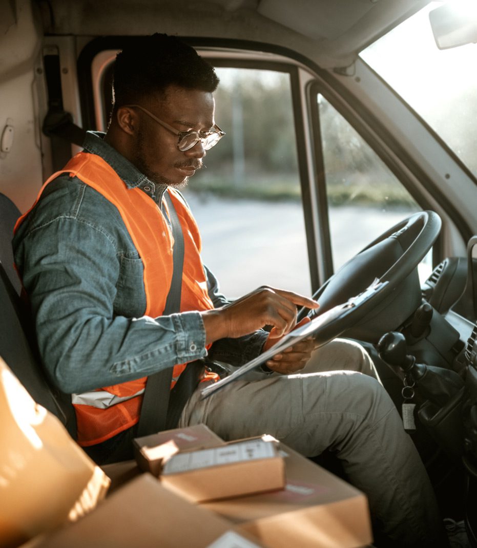 Delivery-truck-driver-preparing-for-trip-to-avoid-accident