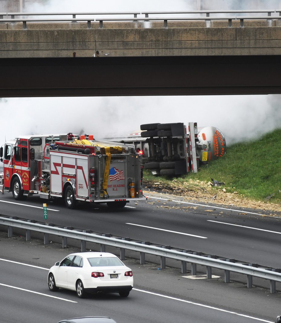 Firefighters-responding-to-truck-accident-and-fire-caused-by-employer-negligence