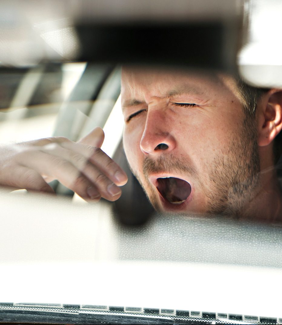 Man-yawning-with-driver-fatigue