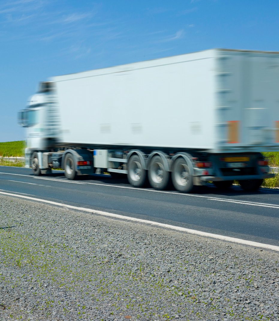 Semi-truck-on-highway-avoiding-traffic-violations