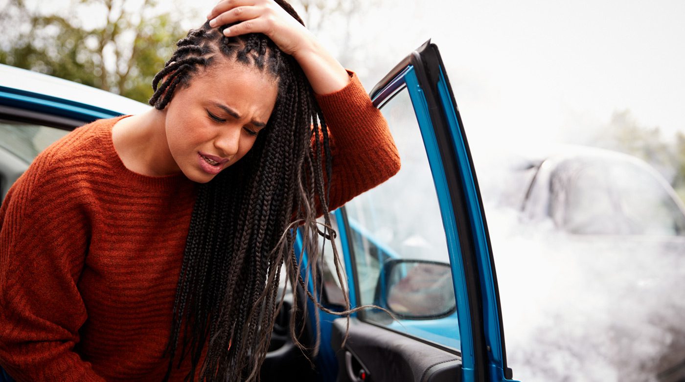 Female-driver-with-head-pain-after-car-accident
