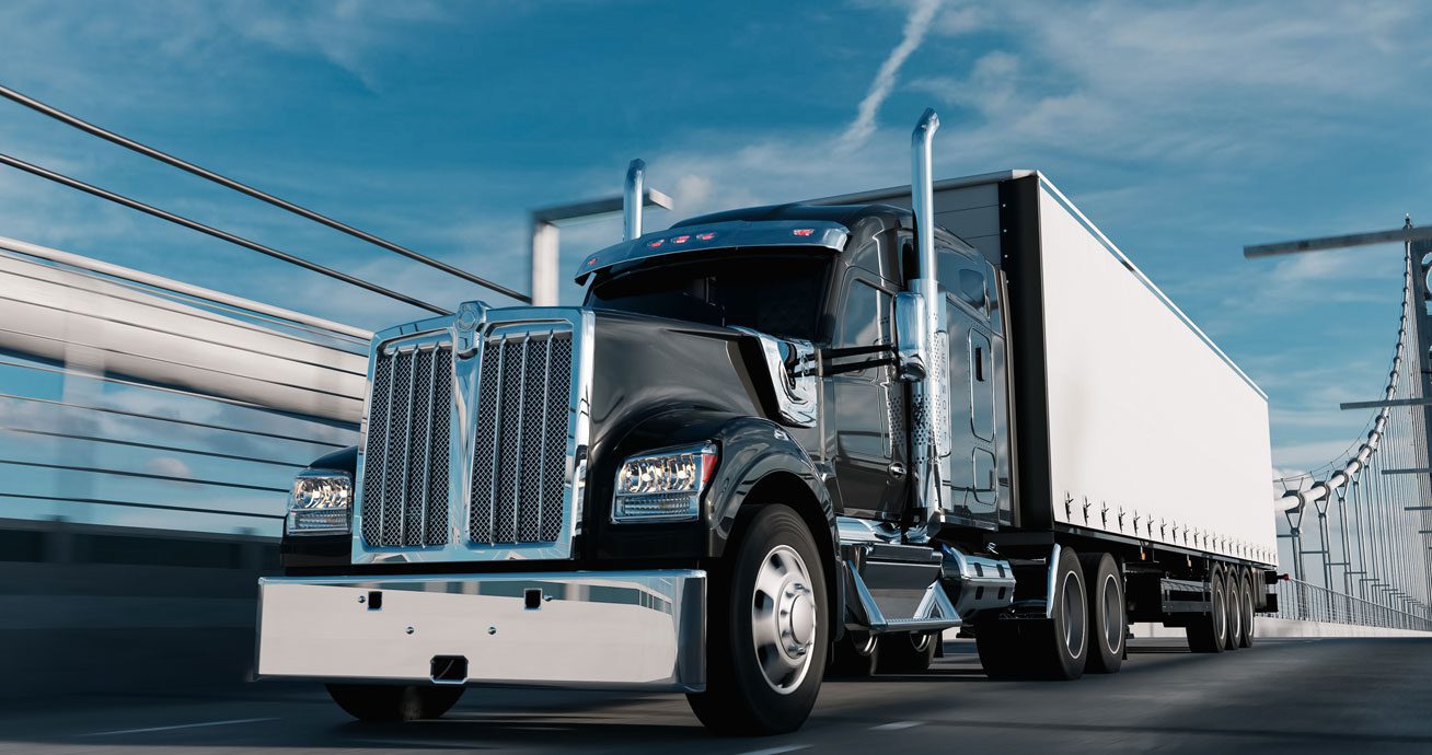 Semi-truck-pulling-trailer-on-highway-roadway