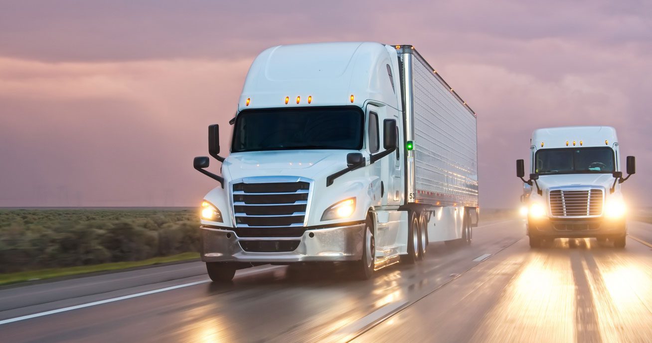 Tanker-semi-truck-driving-on-interstate-highway