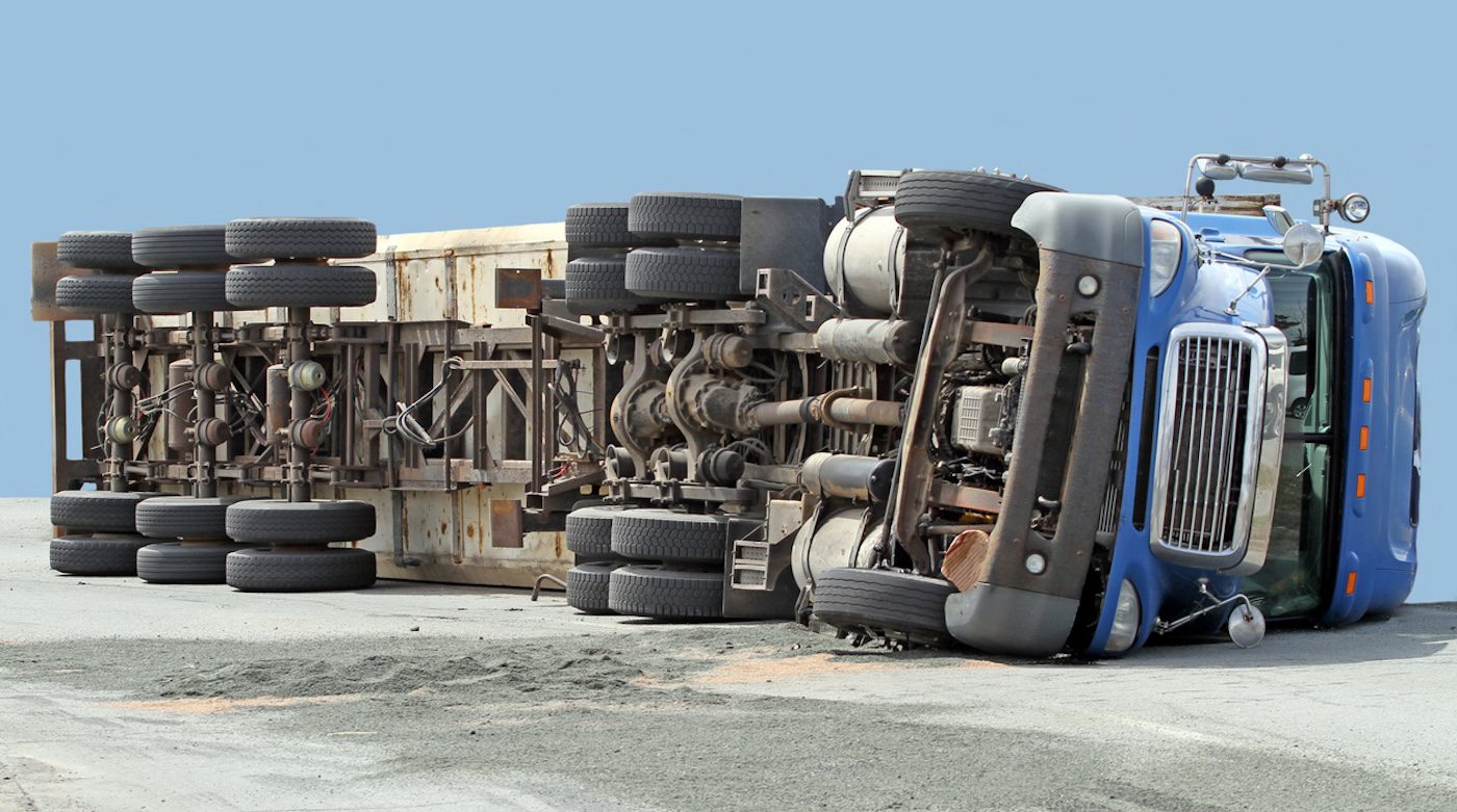 undercarriage view of an overturned big rig